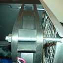 The fan, mounted back from the case grill